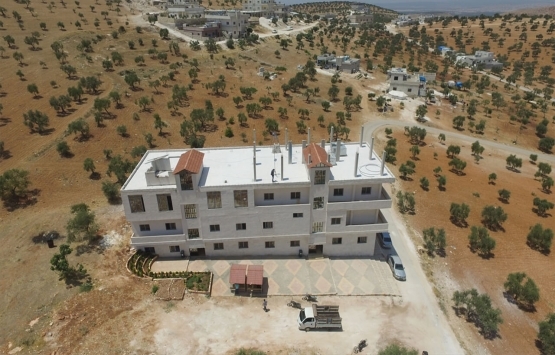 İHH Suriye de 1 yılda 14 bin briket ev inşa etti!