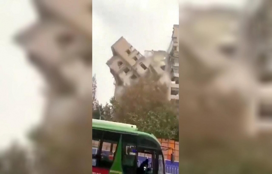 Çin de bina yıkım çalışmasında faciadan dönüldü!