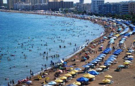 Sıcaktan bunalan plajlara koşuyor!