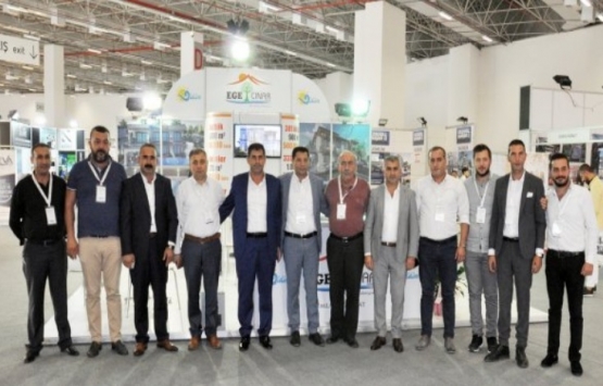 DTO yönetiminden İzmir Emlak Fuarı'na ziyaret!