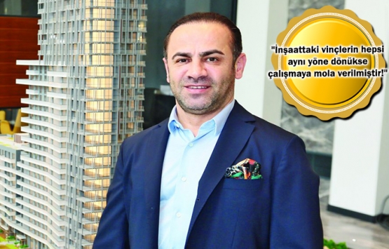 Mesut Sancak, ofisindeki dürbünle inşaat vinçlerinin yönünü gözetliyor!