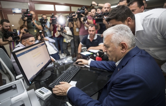 Başbakan Yıldırım bir vatandaşın imar barışı kaydını yaptı!