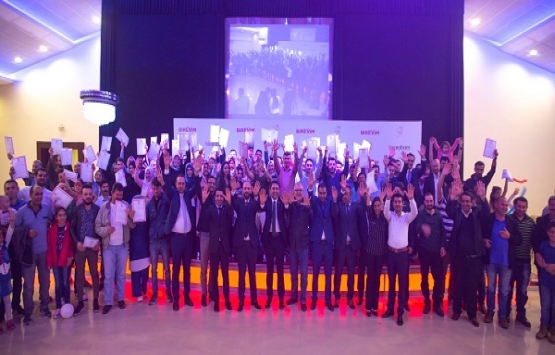 Birevim 100 aileye tapularını teslim etti!